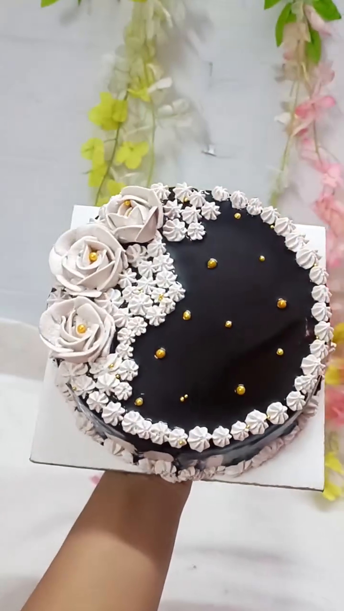 Midnight floral cake by ManhaZaara's Bakehouse