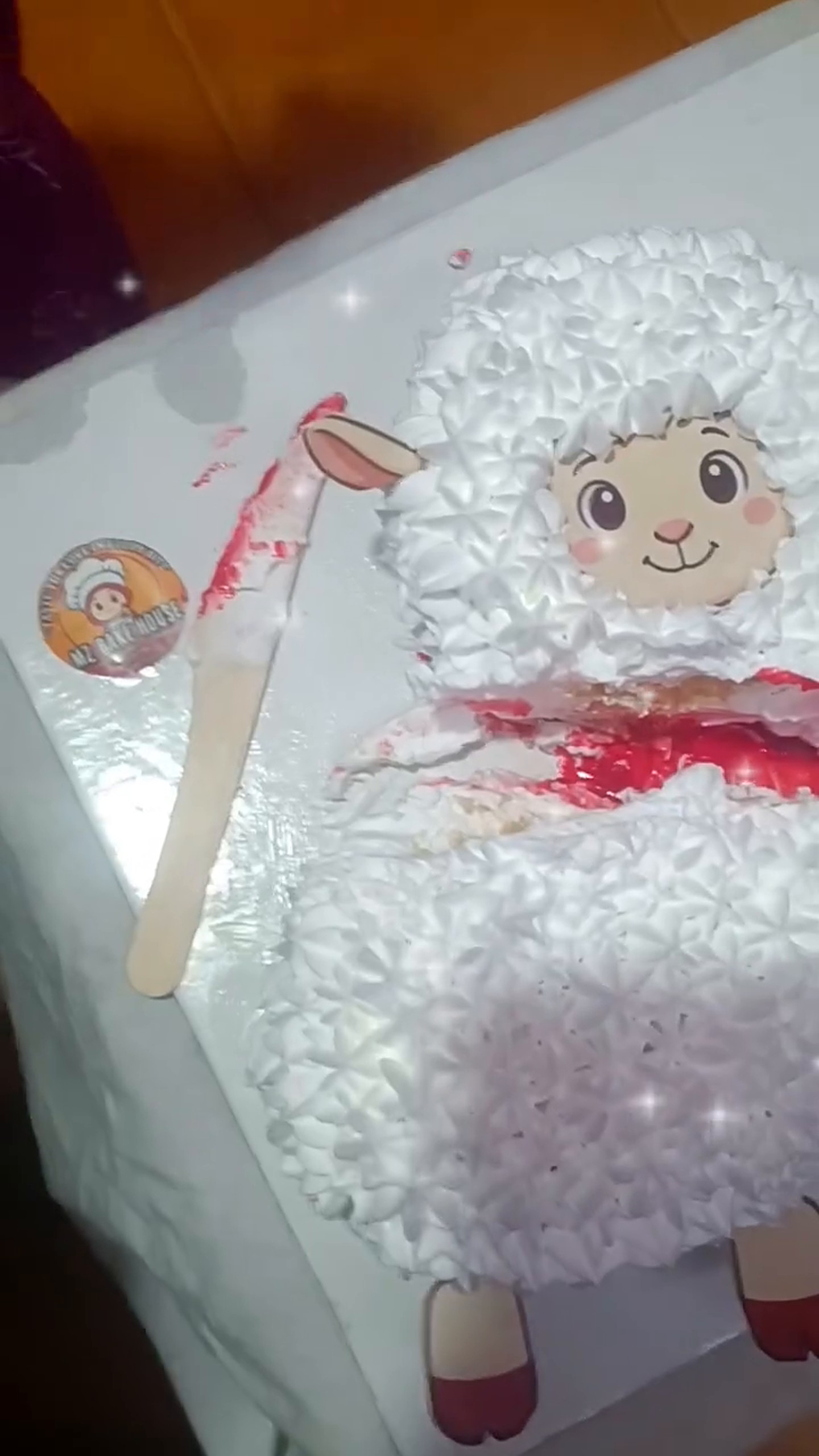 White lamb theme cake for a kids birthday